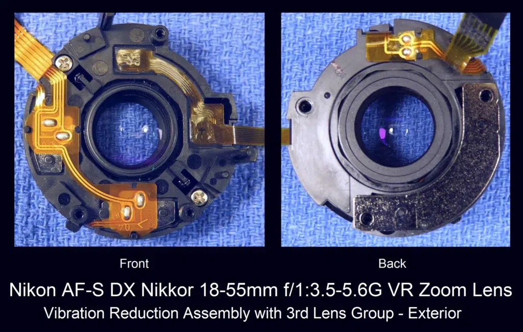 قطعات داخلی یک لنز نیکون تله‌فوتو که مکانیزم لرزش‌گیر (VR) آن در حال تعمیر است